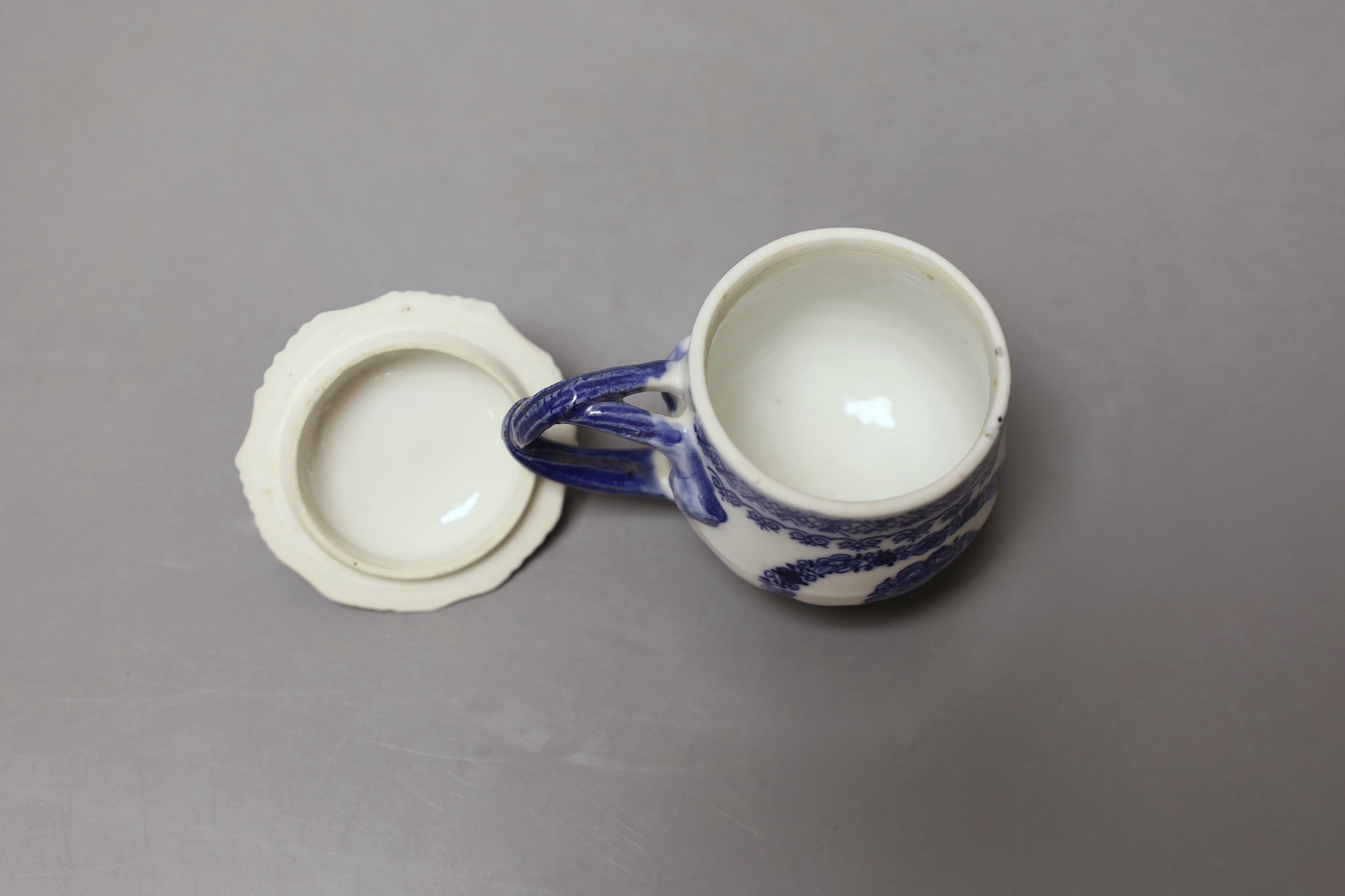 Chinese custard cup and cover painted in under-glaze blue with stylised flowers - 9cm tall